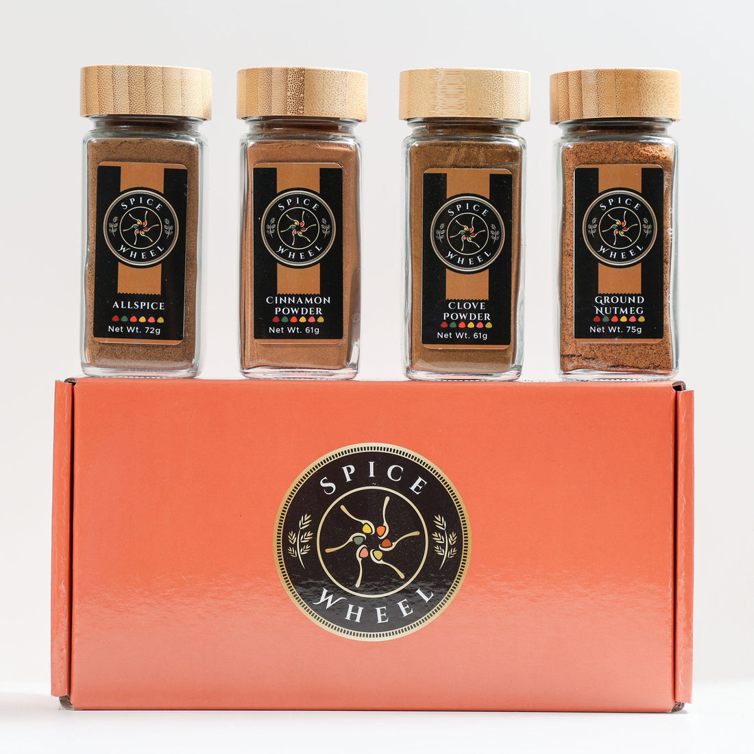 Spice Wheel Sweet Baking 4 Pack Starter Kit featuring four assorted spice jars for baking and cooking.
