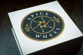Spice Wheel baking spice wheel with colorful sections and labeled spices for baking and culinary use.