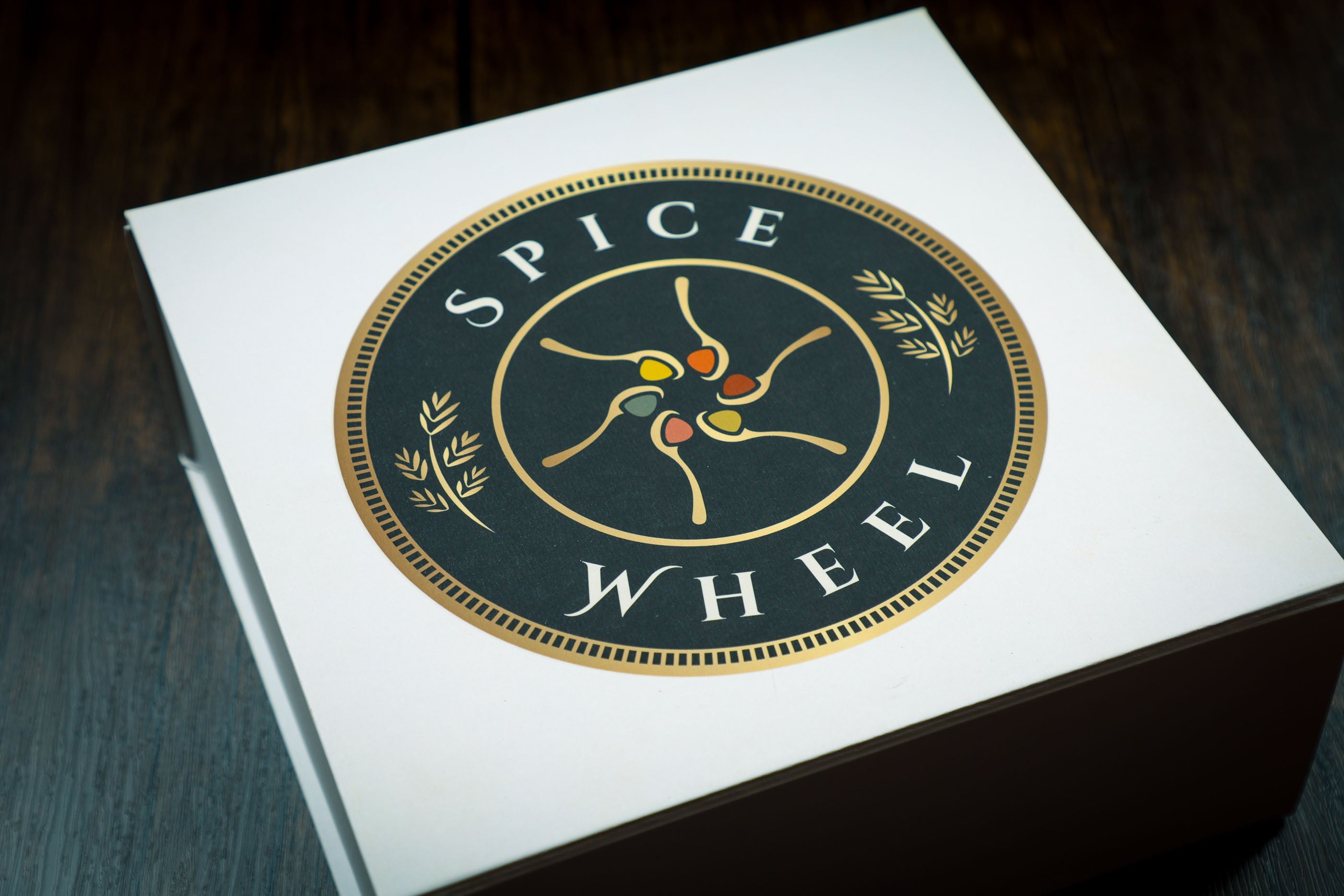 Spice Wheel baking spice wheel with colorful sections and labeled spices for baking and culinary use.