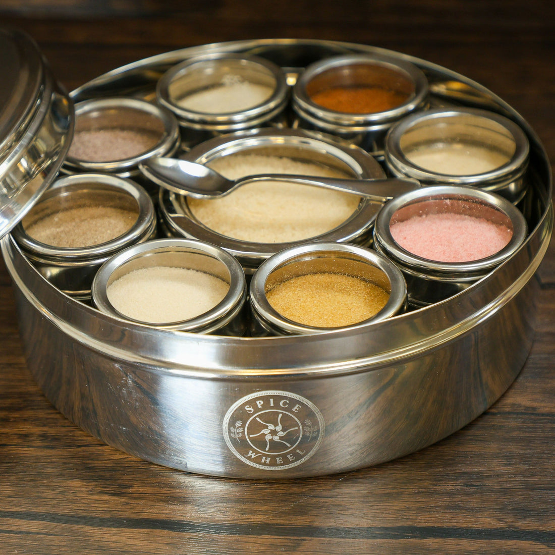 Colorful Spice Wheel featuring flavored sugar and spice blends, showcasing different sections of the Spice Wheel brand spice mix.