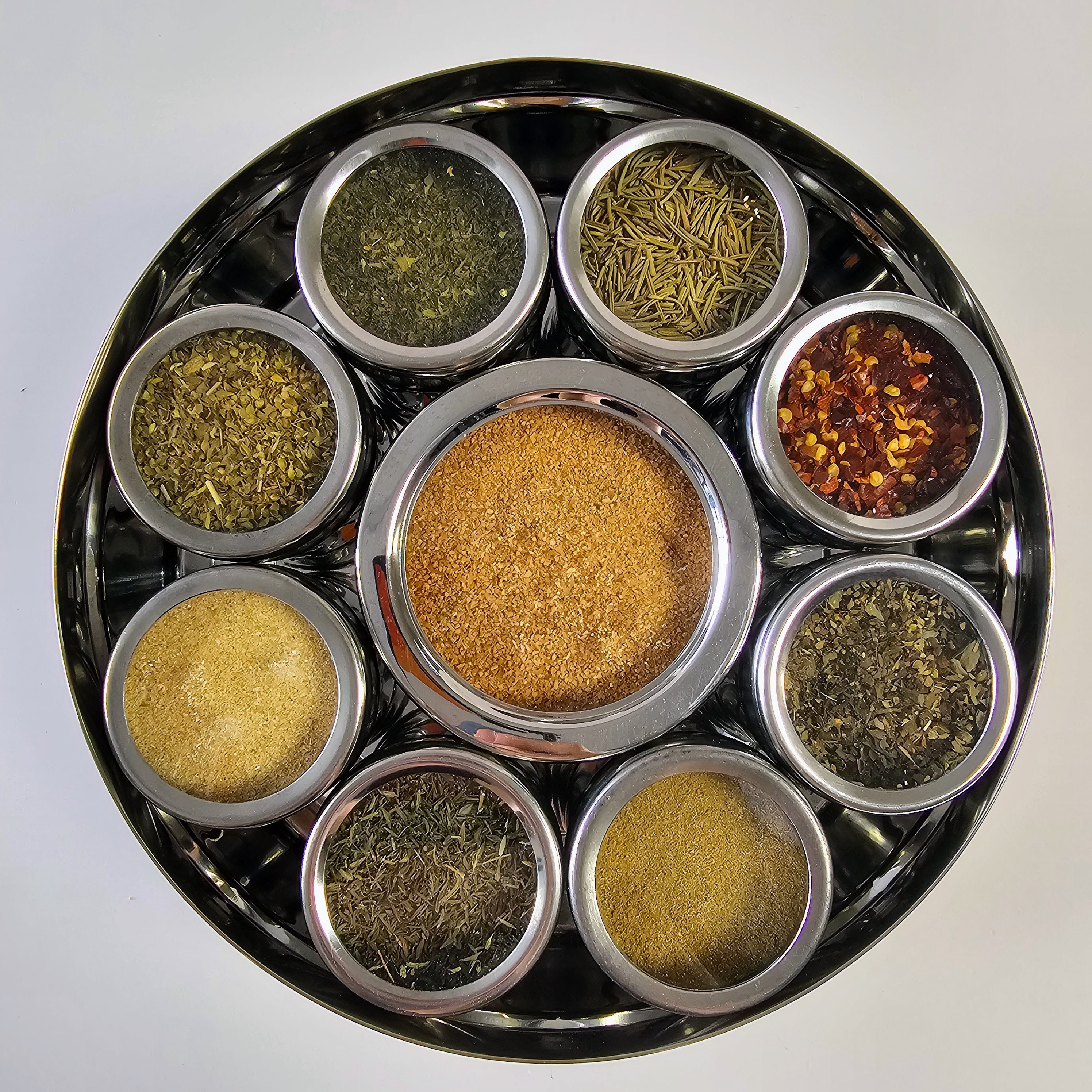 Italian Spice Wheel by Spice Wheel showing colorful sections with various Italian herbs and spices in a circular layout.