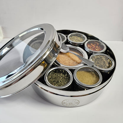 Italian Spice Wheel, a colorful spice wheel with labeled sections of Italian herbs and spices, used for flavoring dishes.