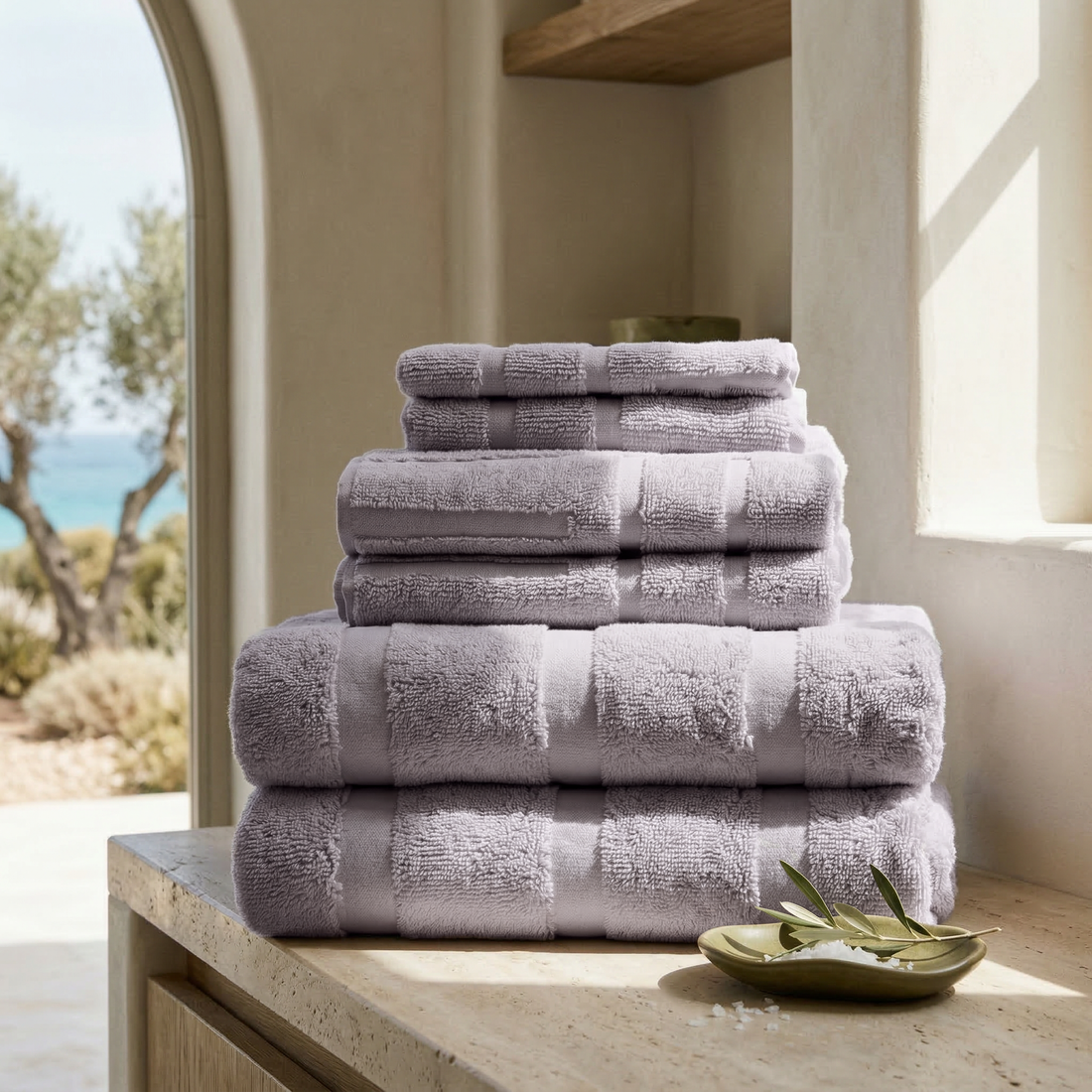Set of Capri Australian Cotton Towels by Italic, soft and plush home bath towels displayed flat on a white background.
