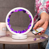 Amethyst healing night light from Conscious Items, promoting relaxation and better sleep with a calming purple glow.