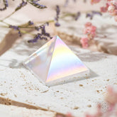 Crystal heart pendant from Summon My Power - Pyramids of Inner Fire collection by Conscious Items, featuring vibrant fire-inspired design.