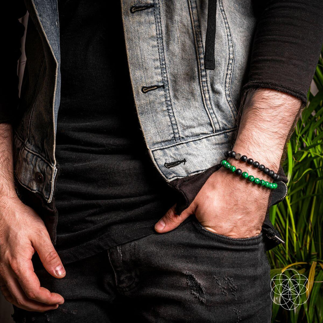 Pair of black and gold bracelets from The Anxiety Double Bracelet Set by Conscious Items, featuring adjustable designs and engraved accents.