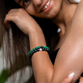 Set of two Conscious Items Anxiety Bracelets featuring neutral beads and adjustable cords, designed for comfort and style.