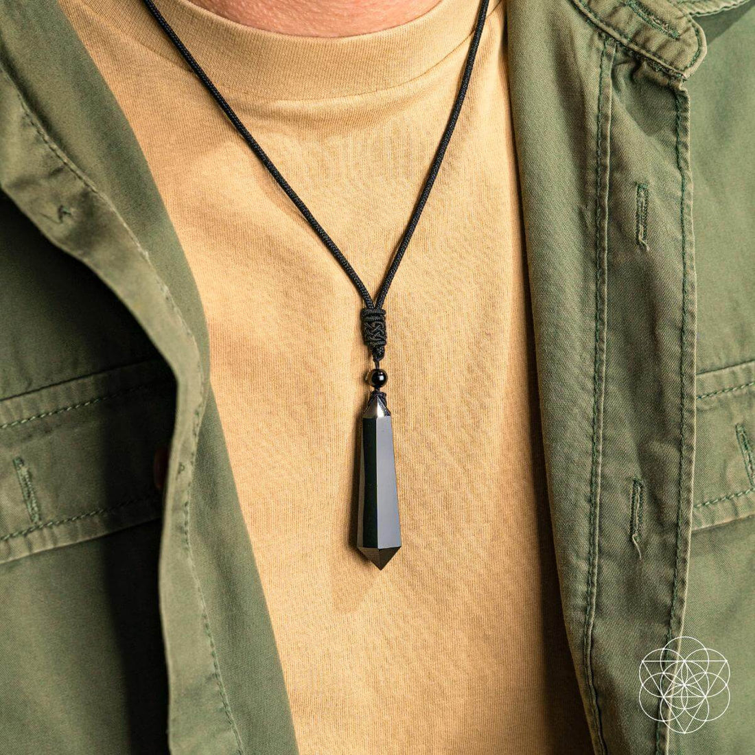 Black obsidian talisman pendant necklace from Conscious Items, featuring a protective gemstone on a sleek cord.