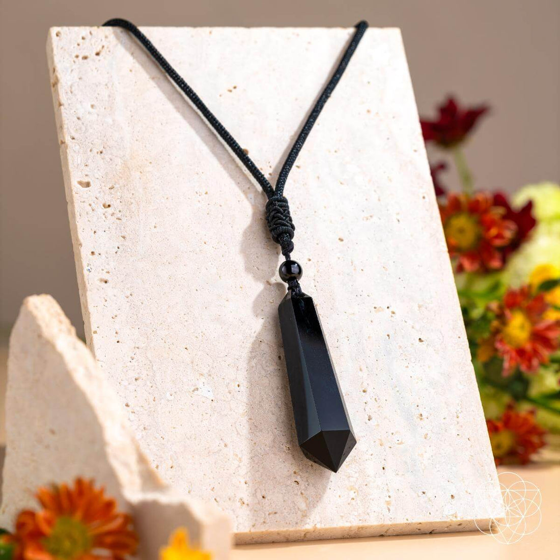 Black obsidian pendant necklace featuring the Talisman of Protection by Conscious Items, showcasing a sleek, polished protective stone design.