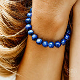 Blue focus bracelet by Conscious Items featuring a sleek, modern design with a smooth band and subtle accents.