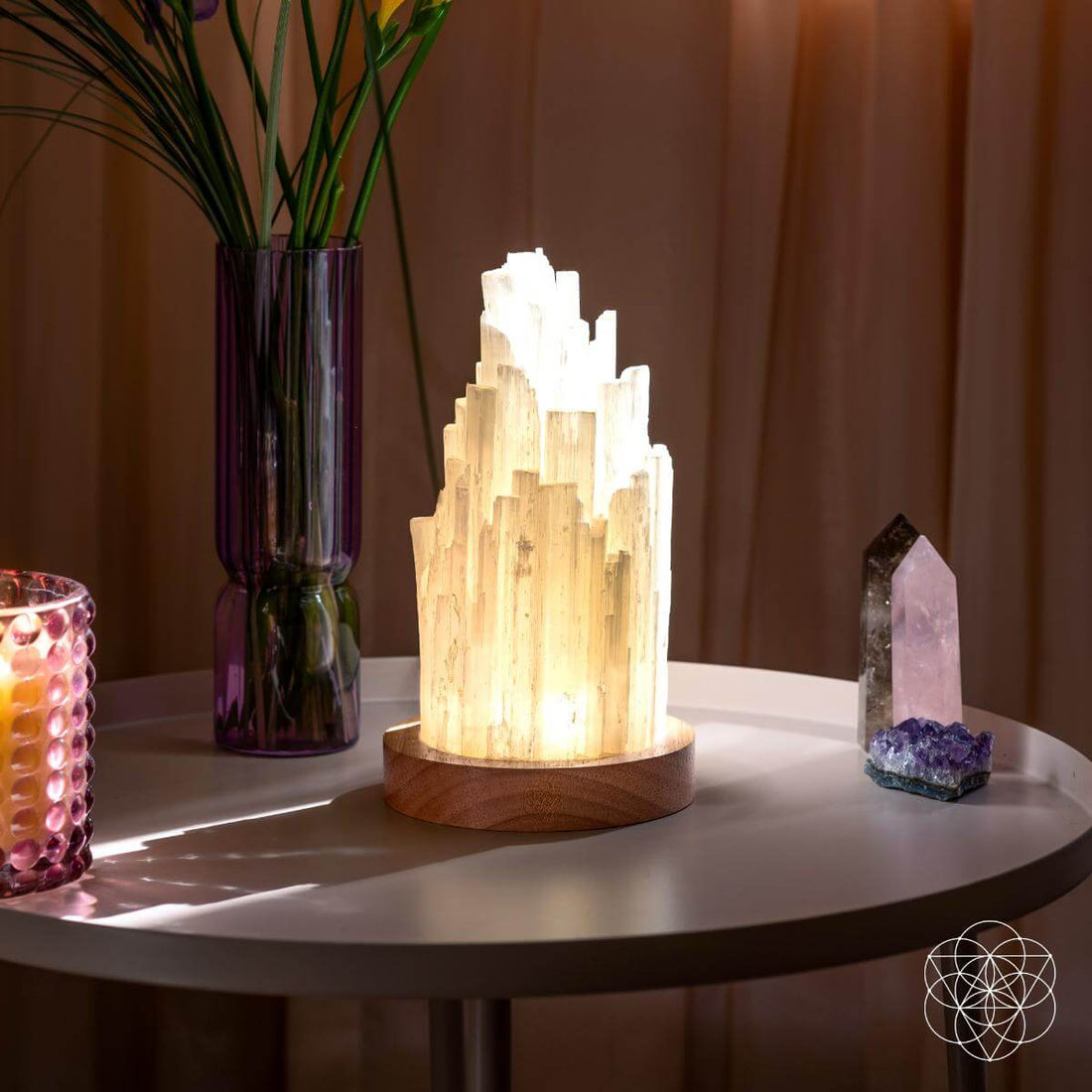 Conscious Items Selenite lamp night light with a 2-pound healing crystal, showcasing its natural white, translucent mineral structure.