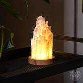 Selenite lamp by Conscious Items, 2 pounds, as a healing night light with a smooth, natural white crystalline appearance.