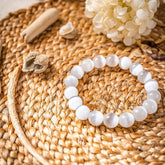 Close-up of The Cleansing Bracelet by Conscious Items, featuring sleek design and adjustable strap on a neutral background.