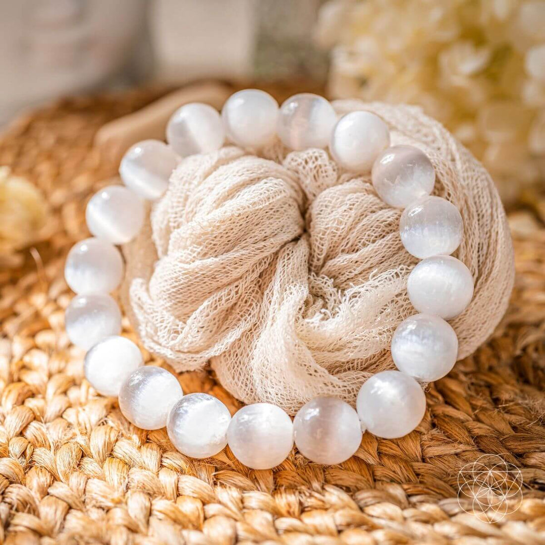Conscious Items The Cleansing Bracelet featuring sleek black beads and a silver charm on a delicate chain.