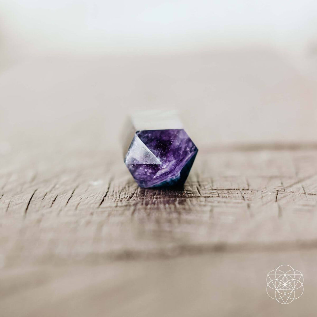 Point and pyramid-shaped cleansing stone by Conscious Items, natural stone with smooth surface for skincare or spiritual use