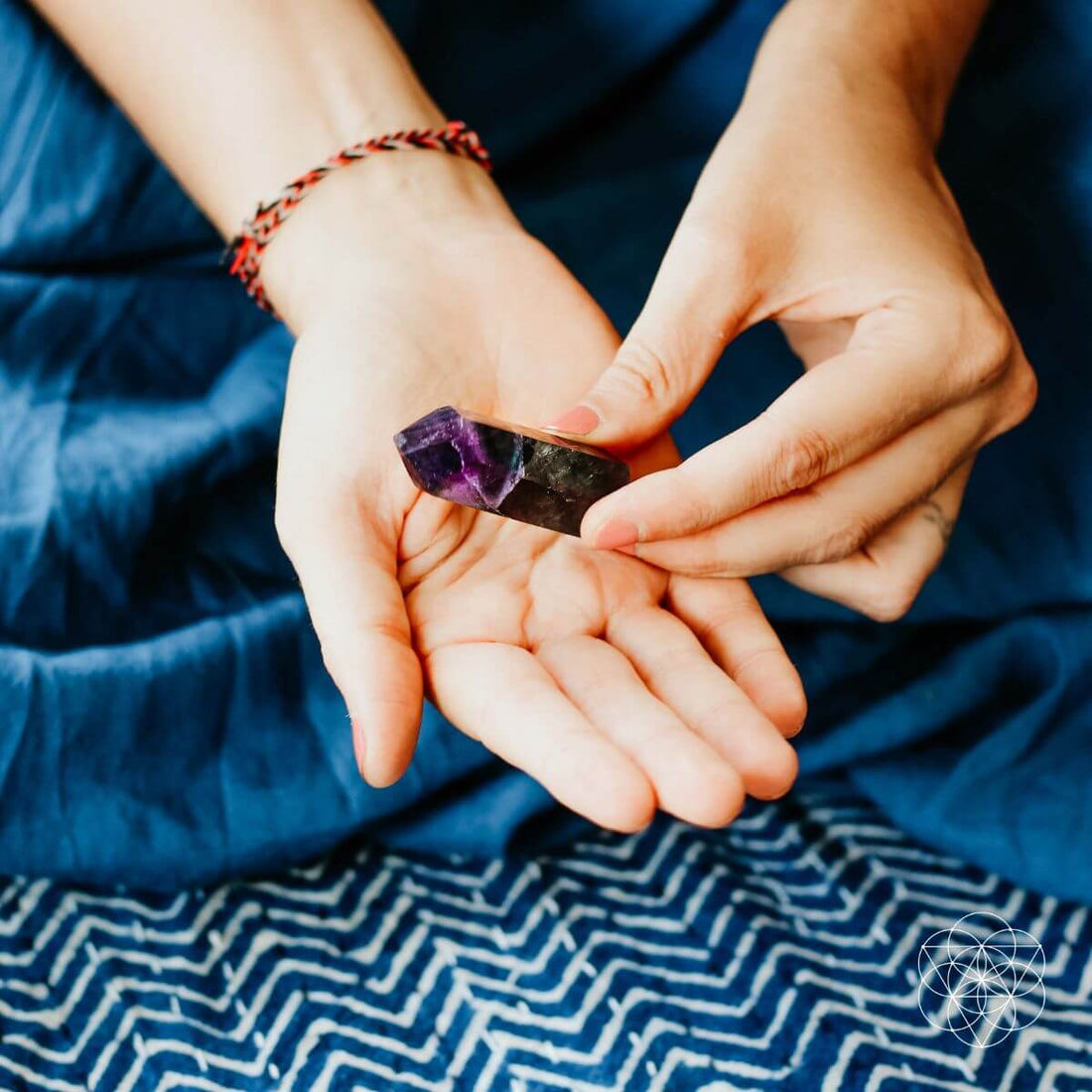 Conscious Items Cleansing Stone, Point &amp; Pyramid shape, natural stone for skincare or spiritual cleansing, close-up view.