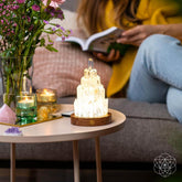 Clear Quartz Manifestation Tower Lamp night light by Conscious Items, featuring a tall, polished quartz tower emitting soft illumination.