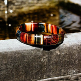 Conscious Items The Determination Bracelet with adjustable cord and engraved charm, featuring inspirational design for motivation and style.