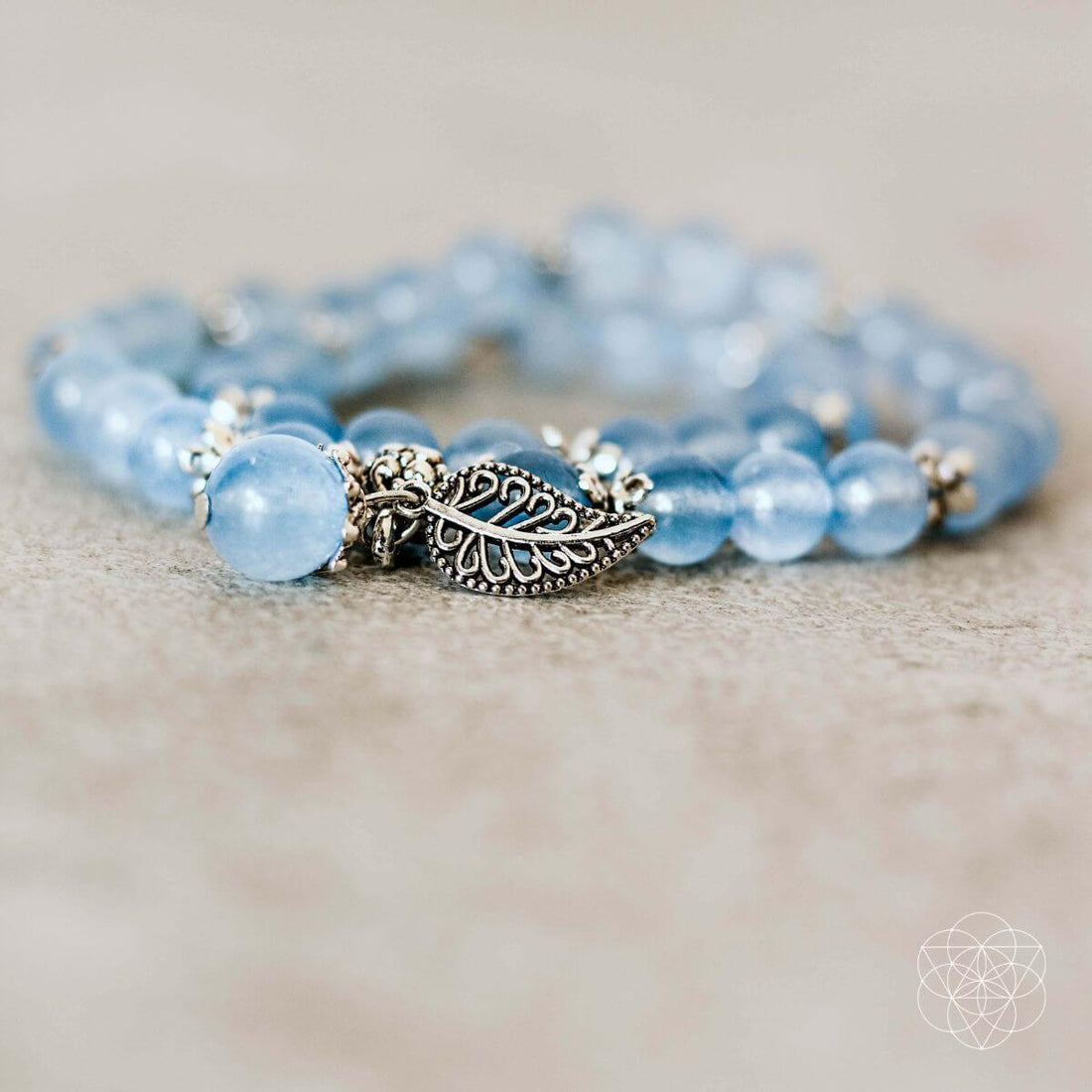 Elegant calming bracelet by Conscious Items featuring smooth beads and a minimalist design, perfect for stress relief and style.