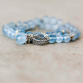 Elegant calming bracelet by Conscious Items featuring smooth beads and a minimalist design, perfect for stress relief and style.