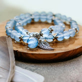 Elegant calming bracelet by Conscious Items featuring smooth beads and a minimalist design, perfect for stress relief and style.