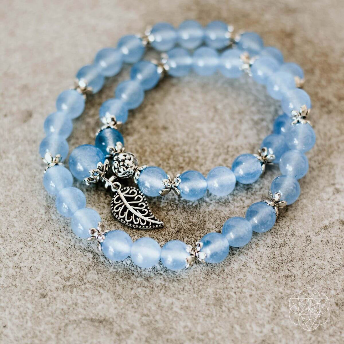 Elegant calming bracelet by Conscious Items featuring smooth beads and a minimalist design for stress relief and style.