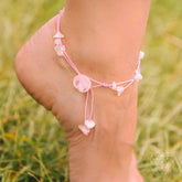 Silver emotional healing anklet by Conscious Items featuring delicate charms and intricate chain design for spiritual balance.