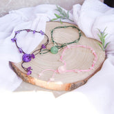 Silver anklet from Conscious Items featuring emotional healing charms, designed to promote positive energy and self-care.