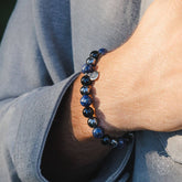 Conscious Items Energy-Shield Bracelet featuring black cord and bead accents, designed as a stylish protective accessory.