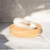 Conscious Items Healing Lamp night light with a calming glow, designed to promote relaxation and wellness in a cozy space.