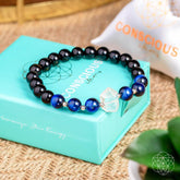 Conscious Items Negativity Filter Bracelet featuring a sleek design with symbolic charms for positive energy and protection.