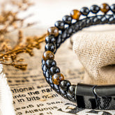 Black leather bracelet with metallic accents from the Professional Success Bracelet by Conscious Items, designed for a stylish look