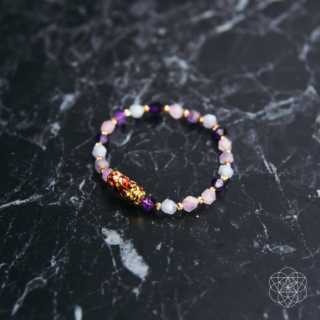 Conscious Items Prosperity Bracelet featuring colorful beads and charms, designed to promote positive energy and prosperity.