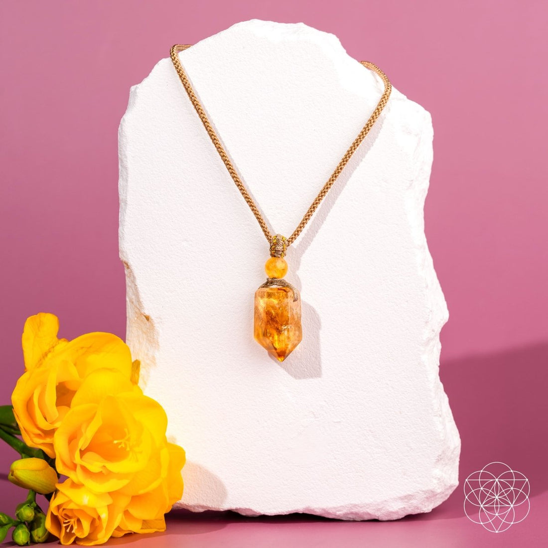 Gold Prosperity Pendant necklace from Conscious Items featuring a detailed charm on a delicate chain.