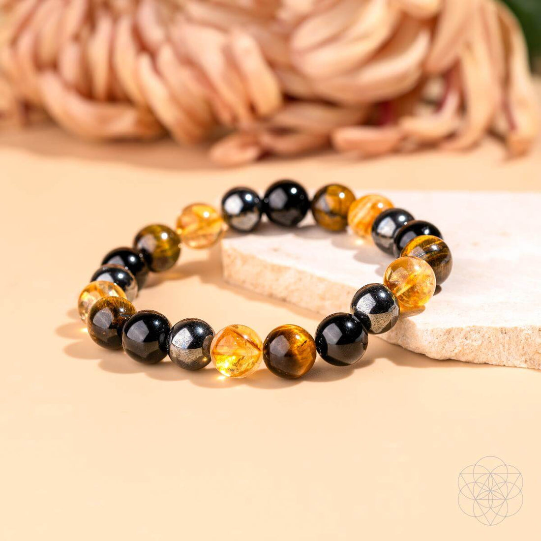 Conscious Items quadruple protection bracelet featuring multiple strands and adjustable clasp, designed for style and wellness.