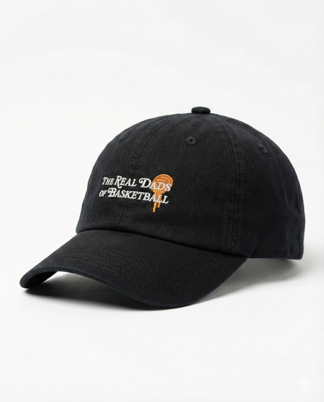 Black and orange Real Dads basketball cap with curved brim and embroidered logo, stylish and sporty headwear for men.