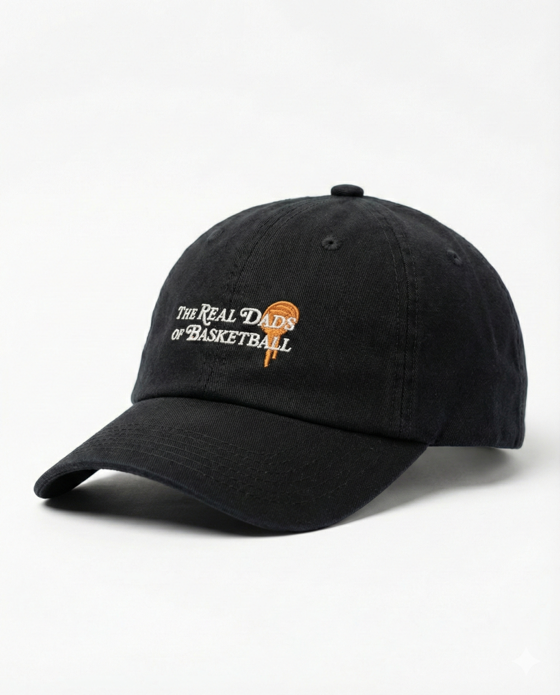 Black and orange Real Dads basketball cap with curved brim and embroidered logo, stylish and sporty headwear for men.
