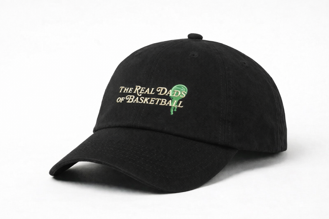 Real Dads BBall Cap in Liberty Green, side view showing adjustable strap and embroidered logo on the front.