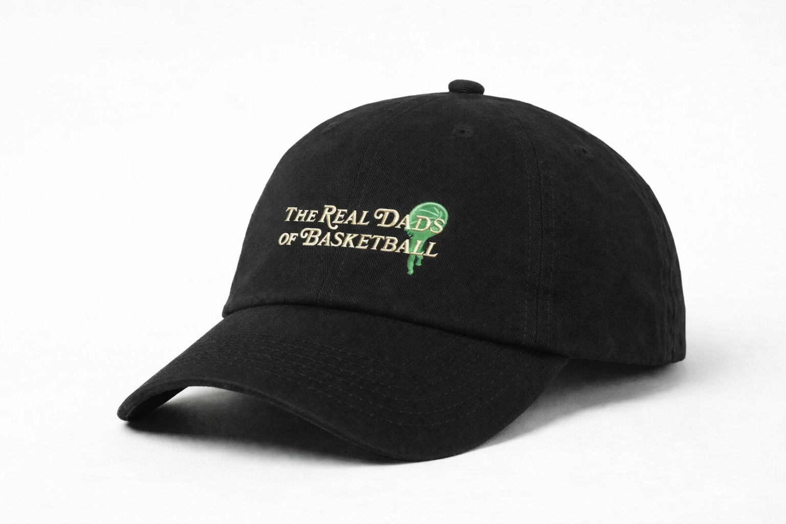 Real Dads BBall Cap in Liberty Green, side view showing adjustable strap and embroidered logo on the front.