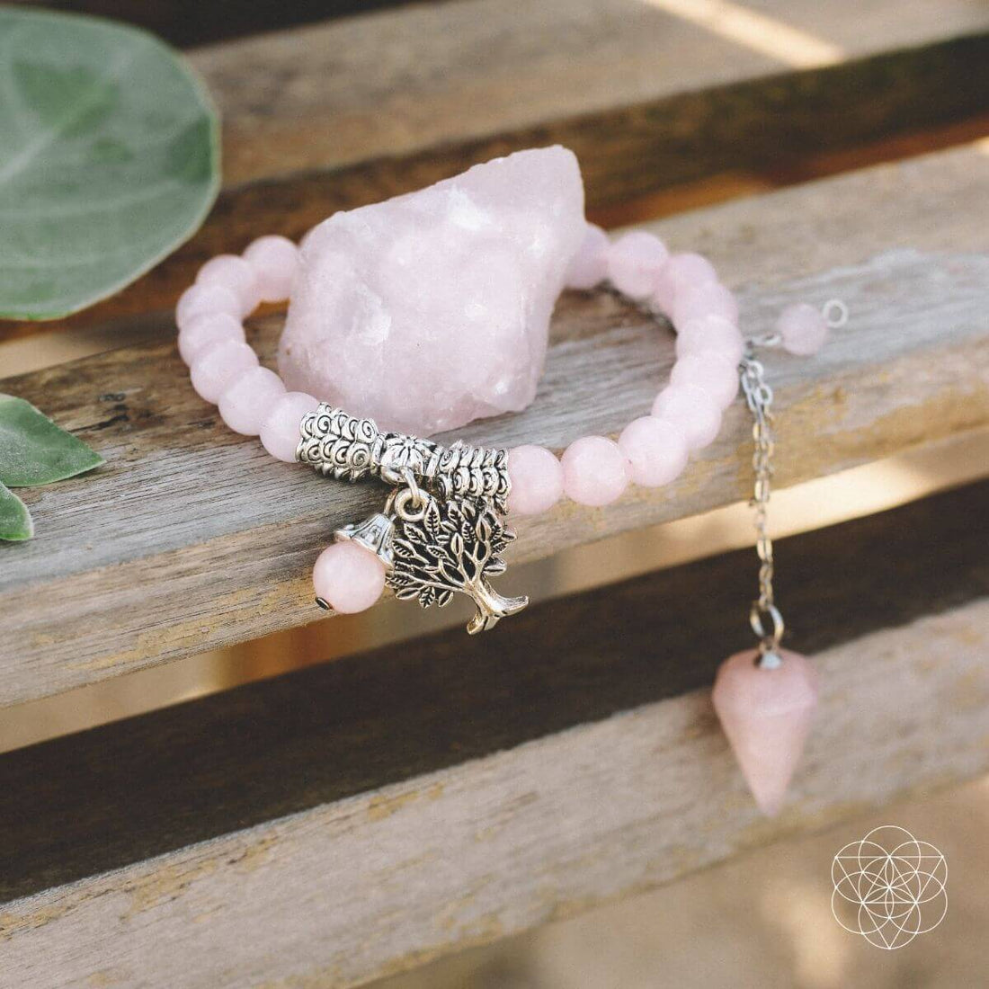 Rose quartz healing crystal jewelry set by Conscious Items, featuring various polished pink crystal pieces with jewelry components.