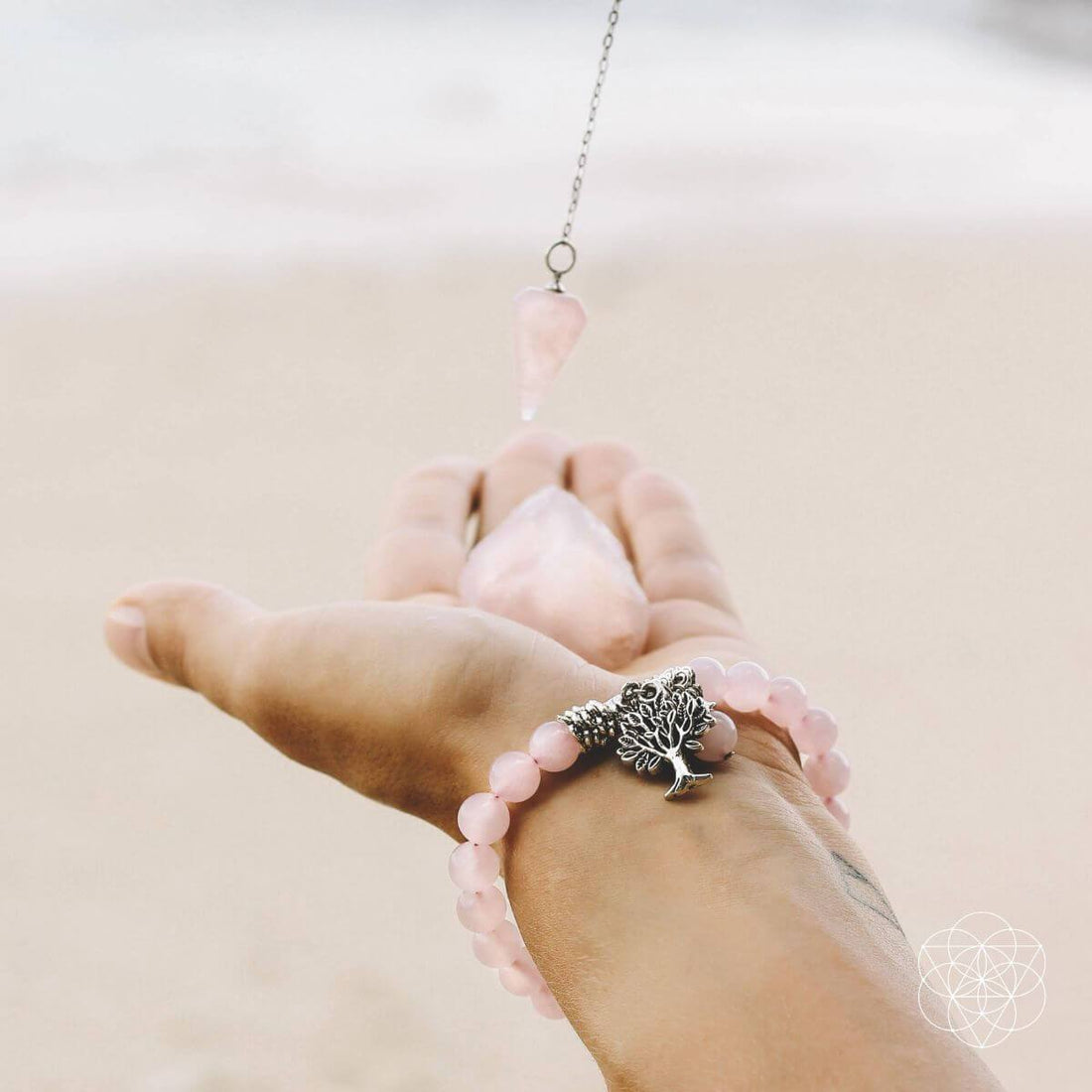 Rose quartz healing crystal jewelry set from Conscious Items featuring heart-shaped pendants and matching bracelets.