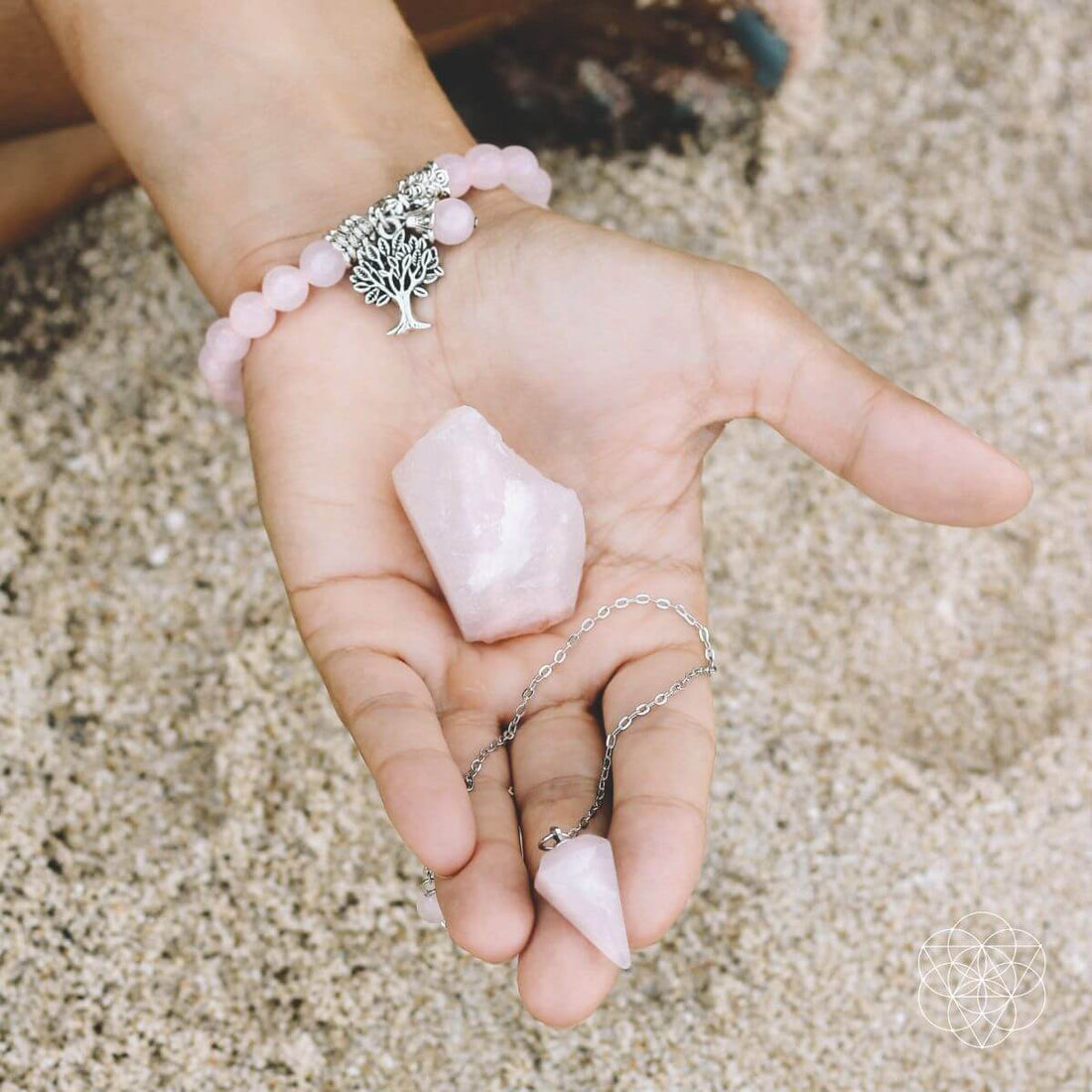Rose quartz healing crystal jewelry set by Conscious Items, featuring polished rose quartz stones and matching jewelry pieces.