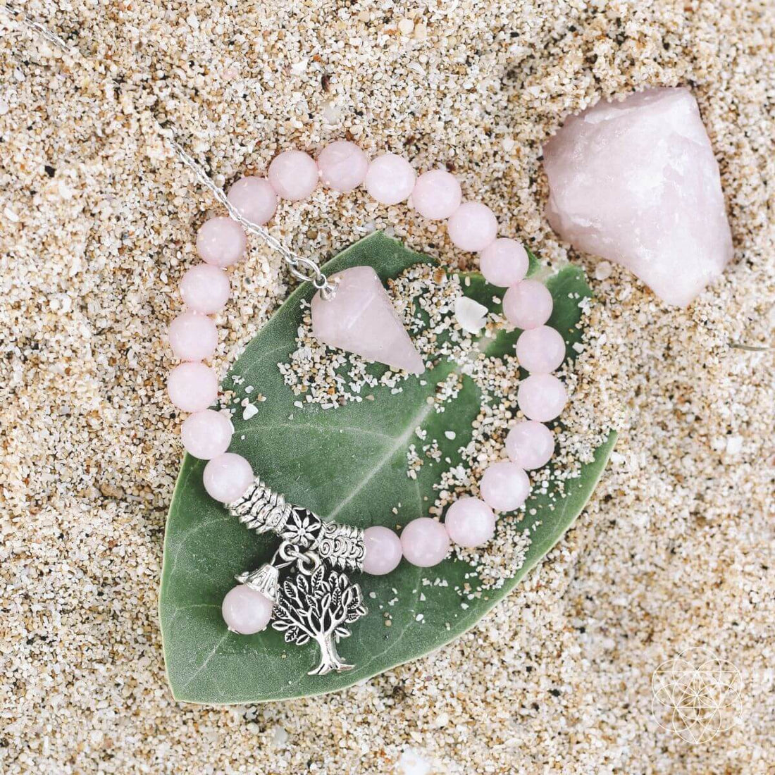 Rose quartz healing crystal jewelry set by Conscious Items featuring pink gemstone necklaces, bracelets, and earrings.