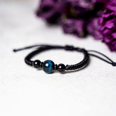 Conscious Items Tiger’s Eye Stability Bracelet featuring polished tiger’s eye beads on a stretch cord for balance and calm.