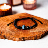 Conscious Items Tiger’s Eye Stability Bracelet featuring polished tiger’s eye beads on a stretchy cord, designed for balance and grounding.