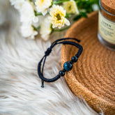 Conscious Items Tiger’s Eye Stability Bracelet with polished tiger’s eye beads on an elastic band, designed for balance and focus.