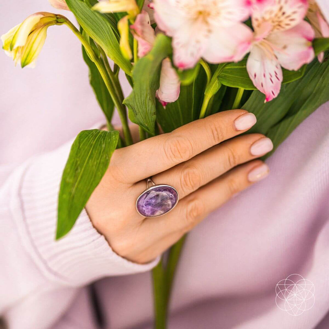 Close-up of The Visualization Ring by Conscious Items, showcasing its sleek band and minimalist design on a neutral background.