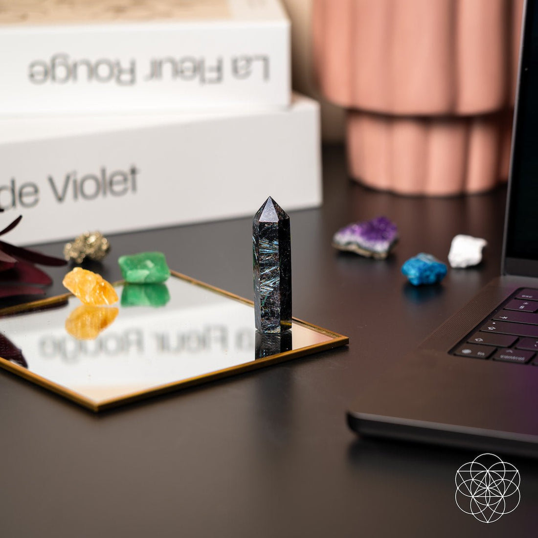Rare Arfvedsonite point home decoration by Conscious Items, showcasing its deep blue crystal with natural mineral formations.