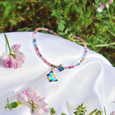 Tourmaline Anklet of Hope by Conscious Items featuring a delicate silver chain with colorful tourmaline gemstones.