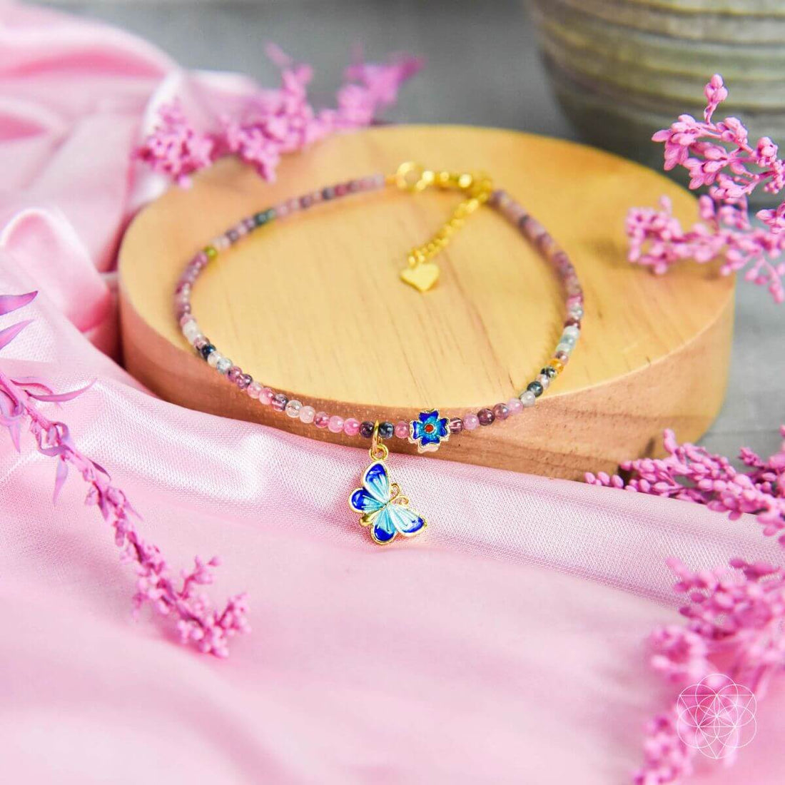 Tourmaline Anklet of Hope by Conscious Items featuring a delicate chain with colorful tourmaline stones.